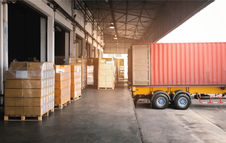 A freight truck loading up supplies